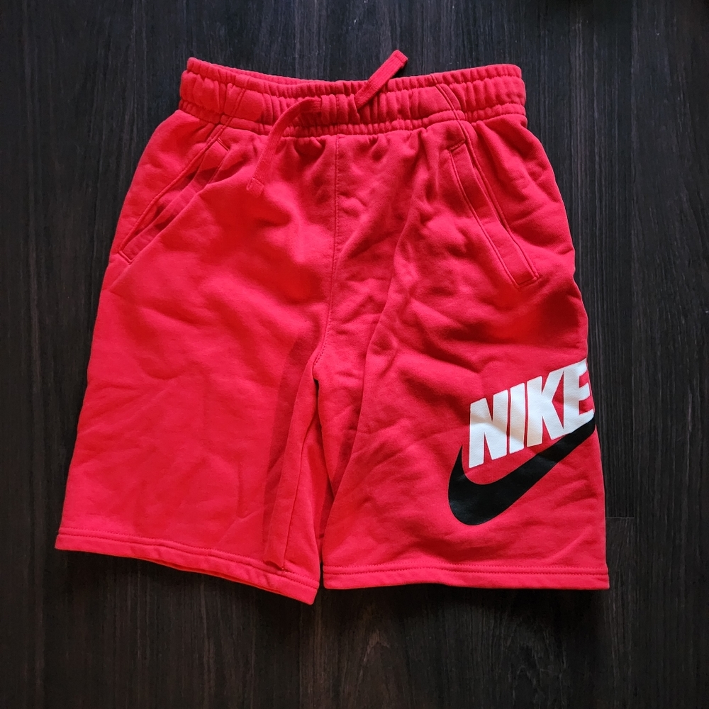 red nike shorts
